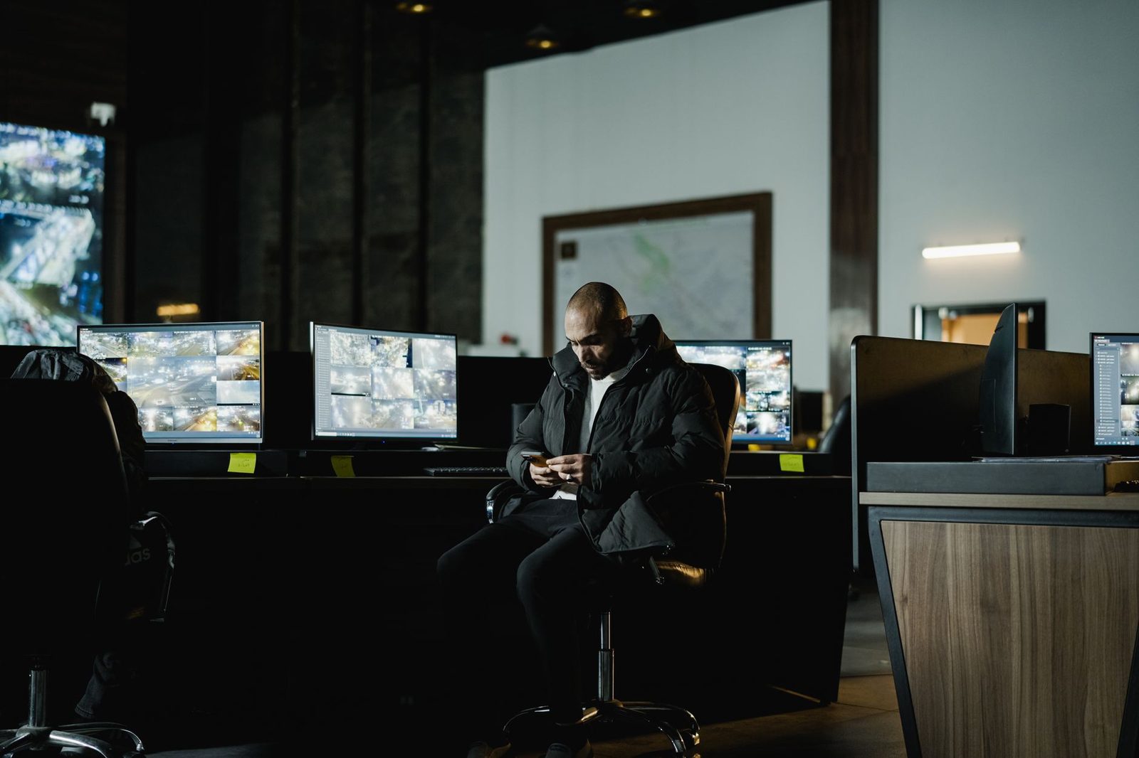 network operations security center analysts monitoring...