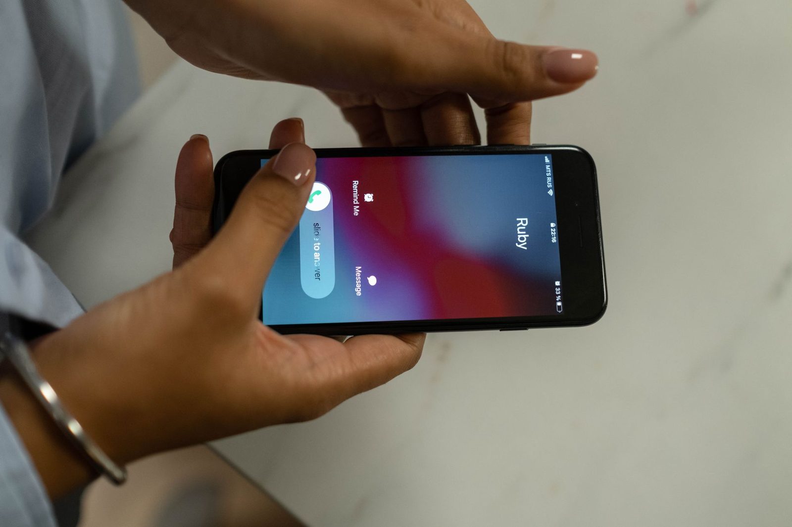 person holding smartphone video call incoming caller...